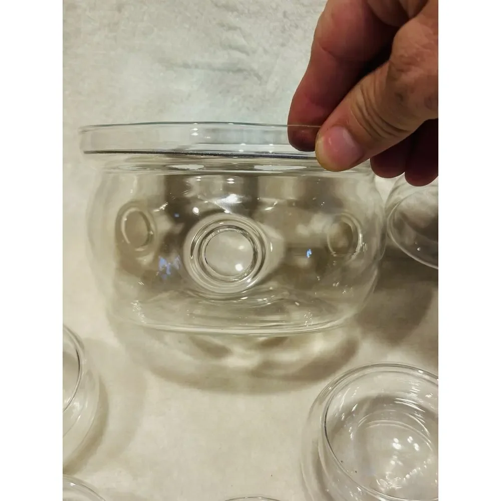Shou Gong 27 oz glass filtering tea maker teapot with a warmer and 6 tea cups